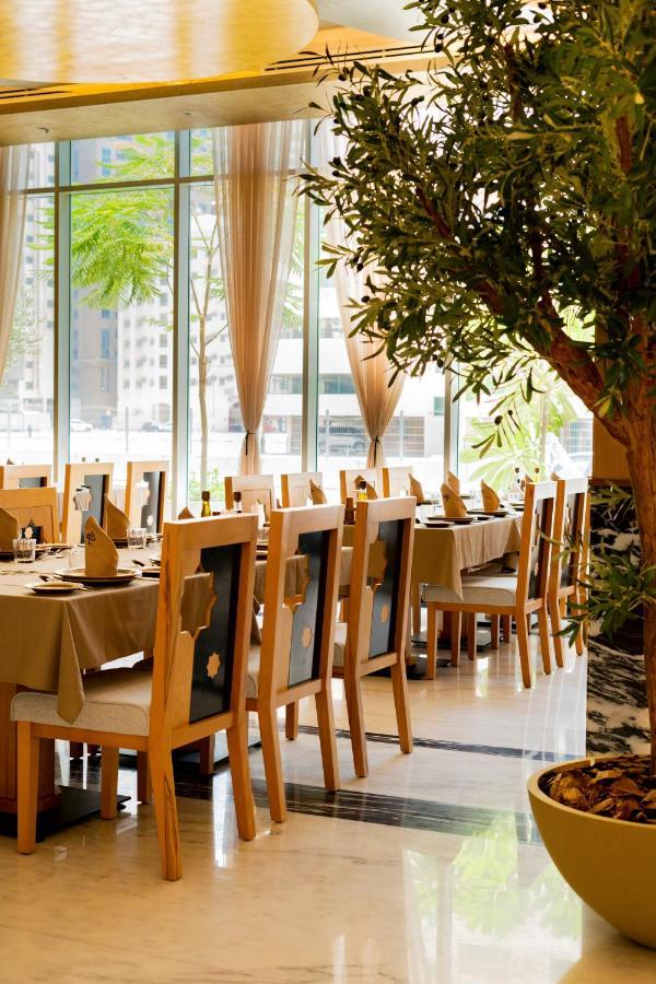 Luxe Grand Hotel Apartments Sharjah Eksteriør bilde Restaurant